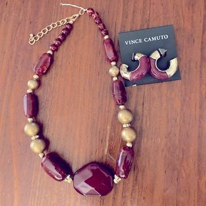 Necklace and earring set. Was gifted to me but I never wore it. Gold/Wood